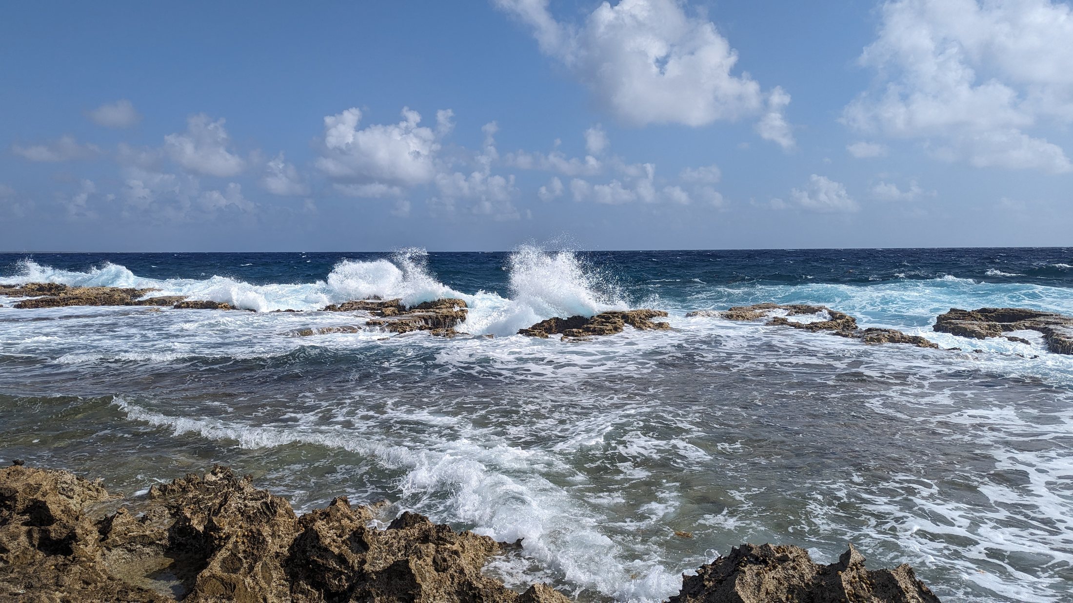 Waves along a rocky Caribbean coast