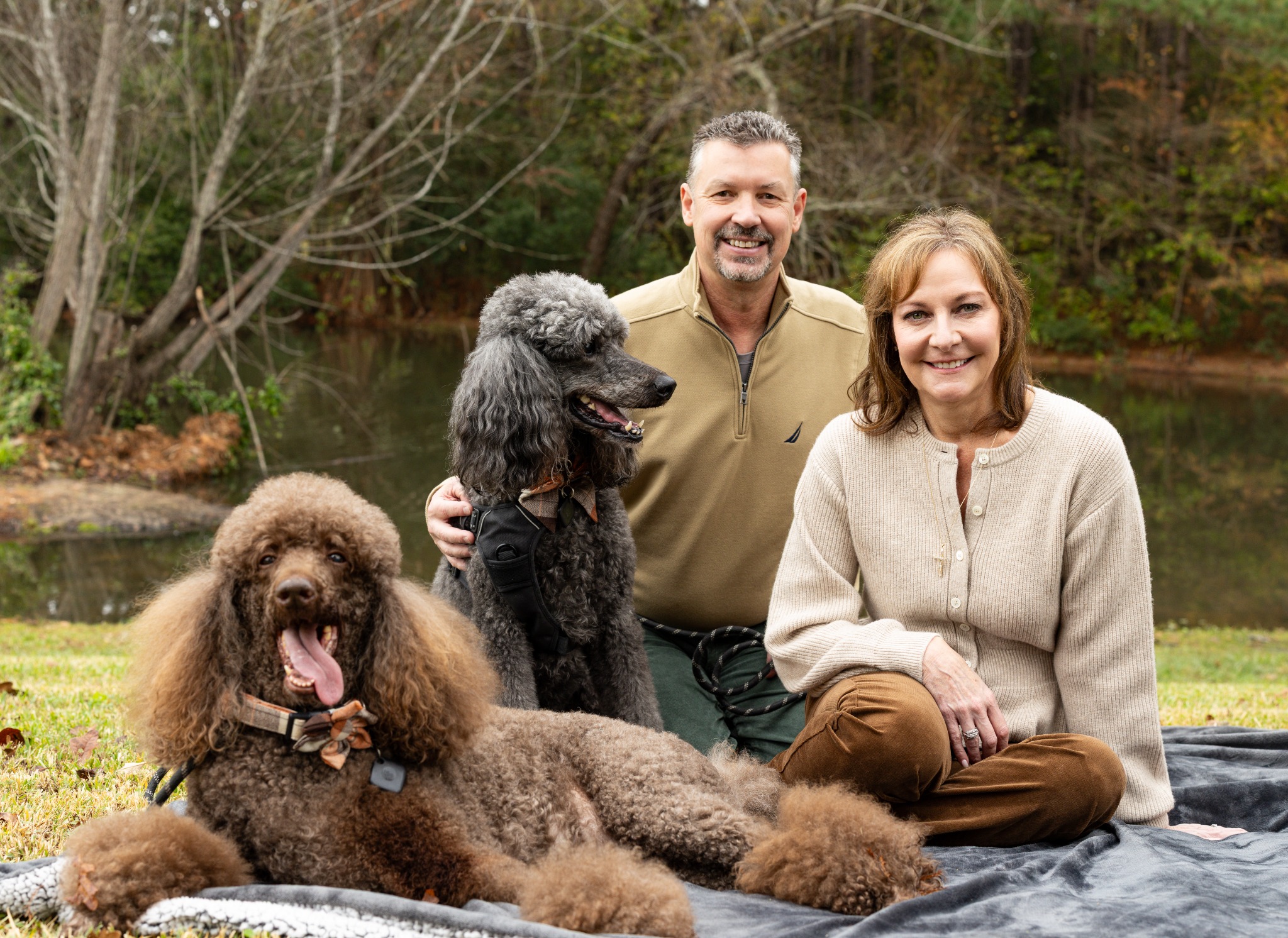 The ZosoPage family outdoors with their dogs